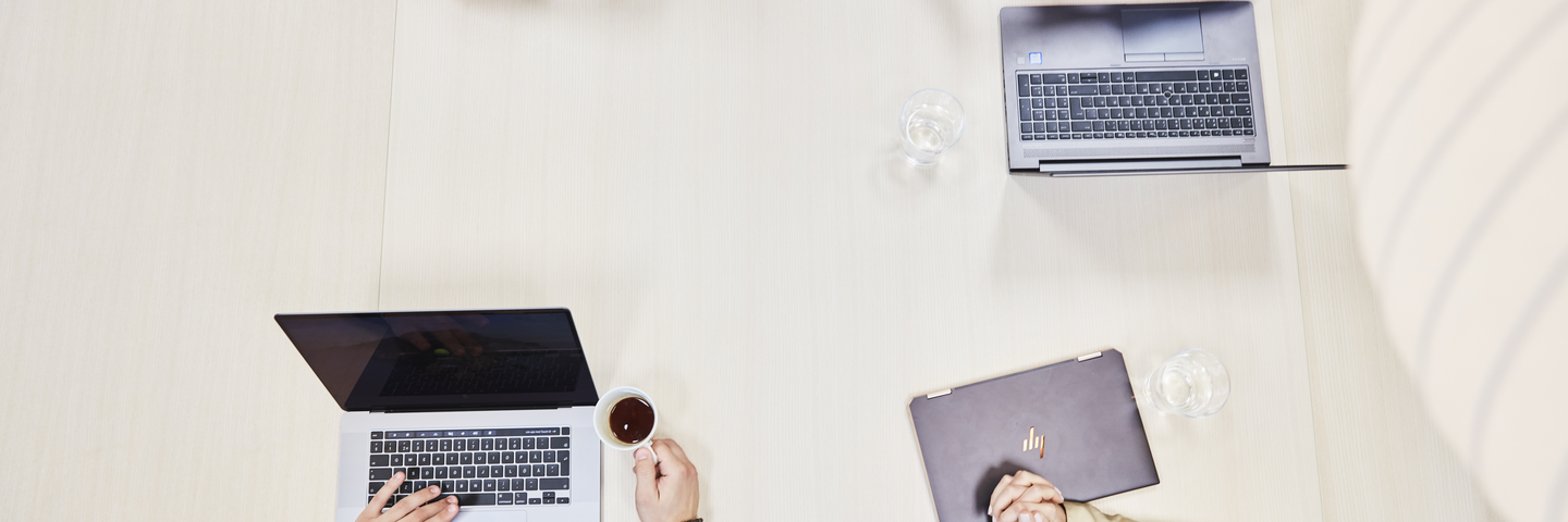 Head Quarter Lindab Malmö Four people in meeting taken from above computer Indoor air environment photo shoot session Aura